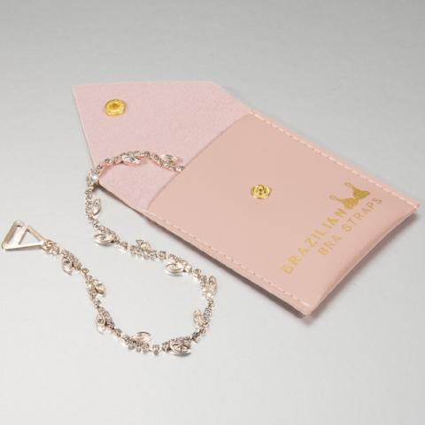 rose gold bra straps on pink pouch