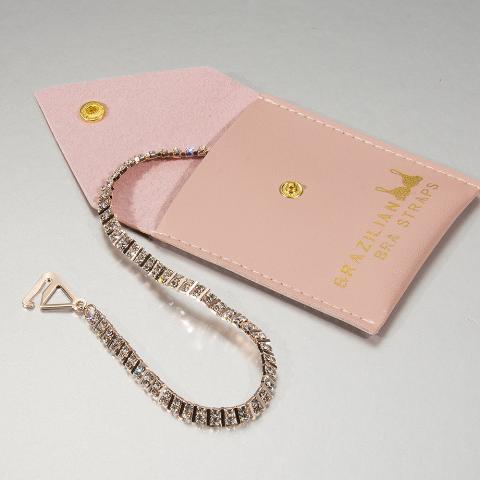 pink bra straps on a pink pouch