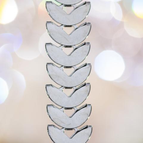 silver, shiny bra straps on silver