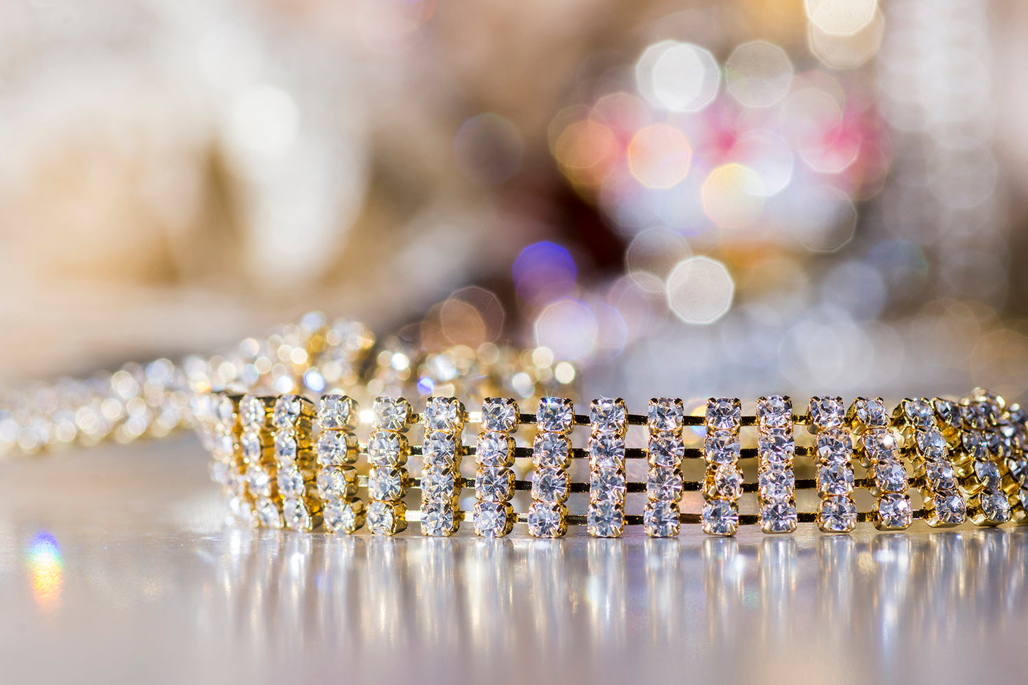 close up gold bra straps with silver crystals